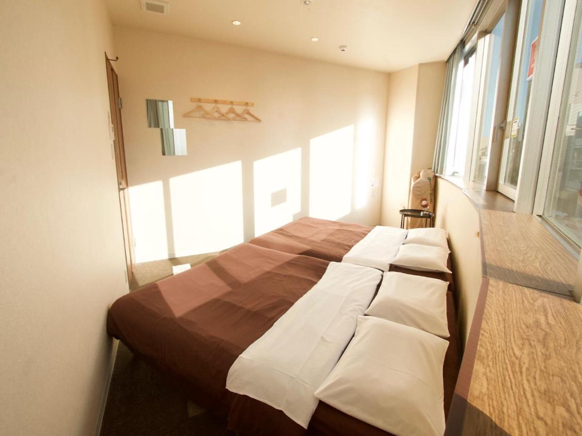 Osaka Guesthouse Nest Екстер'єр фото