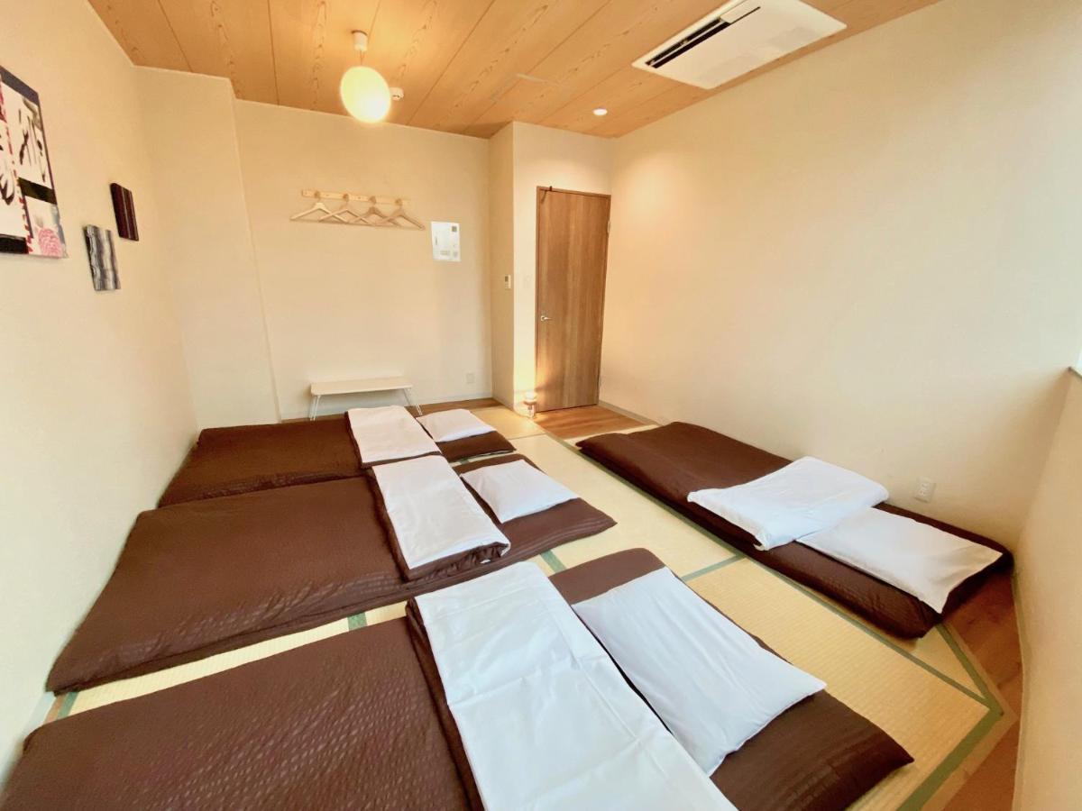 Osaka Guesthouse Nest Екстер'єр фото