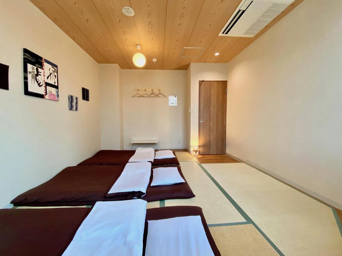 Osaka Guesthouse Nest Екстер'єр фото
